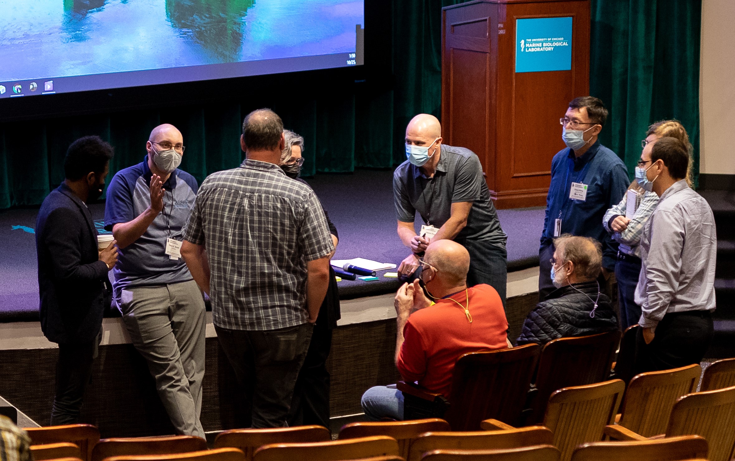 Colleagues talking at the BINA 2022 Community Congress